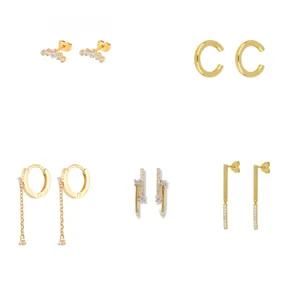 Set of 5 stylish gold-plated cubic zirconia earrings, trendy minimalist ear jewelry.