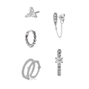 Detailed close-up of fashion silver plated cubic zirconia flower earrings and cuffs set.