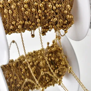 Gold beaded chain detail showing intricate metal links and shiny finish for DIY jewelry crafting.