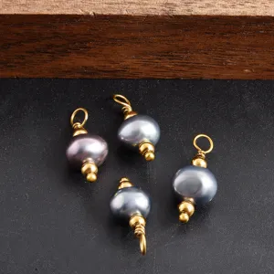 Graue Perle Goldmetall DIY Charm Anhänger Detail Nahaufnahme für Schmuckherstellung Zubehör