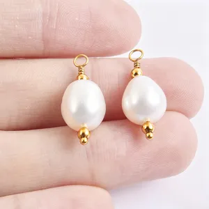 Detail view of baroque natural freshwater pearl charm pendant with golden pin for DIY jewelry.