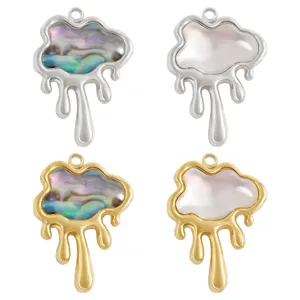 Close-up detail of stainless steel cloud shell pendant charms, showcasing exquisite texture.