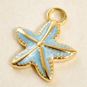 Gold plated light blue enamel starfish pendant detail, DIY jewelry making accessory close-up