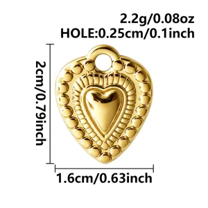 Detailed view of gold vintage heart pendant charm, showing precise dimensions and hollow bead design.