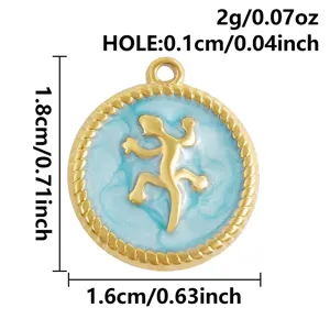 Colgante redondo de acero inoxidable dorado con esmalte azul y elegante geco para joyas.