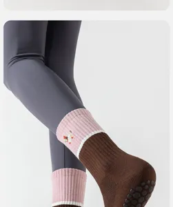 Detailed view of non-slip pilates yoga socks in mid-tube design, perfect for fitness workouts.