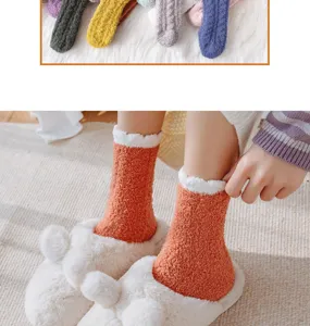Cozy coral fleece winter socks close-up, thick plush warm fuzzy home floor socks detail