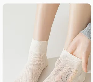 Women summer thin mesh silk socks, breathable short tube socks for daily wear and comfort.