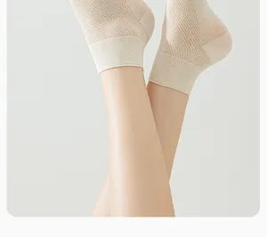 Close-up of breathable mesh summer short socks in beige, showing detailed knit texture.