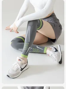 Detailed view of women's sports compression knee sleeve, breathable knit fabric for running.