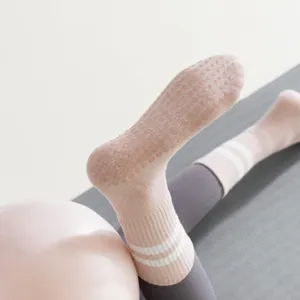 Women's non-slip yoga socks with grip dots, mid-tube striped pilates and fitness sports socks.