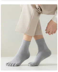 Detail view of men's grey five toe socks showing breathable split design and comfortable fit.