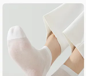 Close up detail view of men's thin breathable silk summer short socks, low cut comfort.