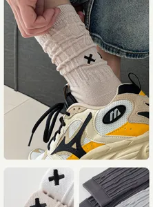 Detailed view of men's stackable cotton socks featuring stylish embroidery and comfortable fit.