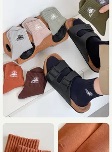 Men's cotton mid-tube socks with stylish mountain embroidery, breathable and comfortable.