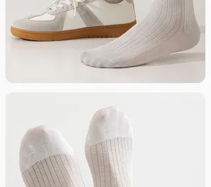 Close-up of men's ribbed silk socks showing fine fabric texture and breathable comfort.