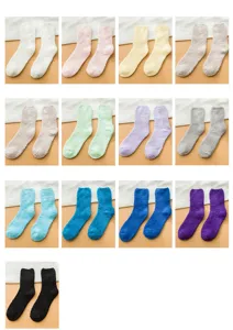 Detailed view of thick fuzzy winter coral fleece home socks in various solid color options.