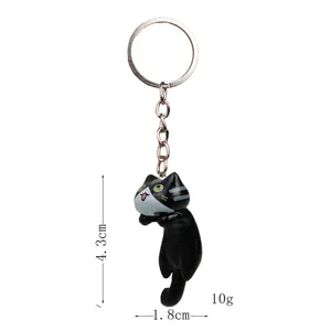 Detailaufnahme des süßen schwarzen Katzen-Schlüsselanhängers mit Maßen 4,3cm mal 1,8cm und 10g.