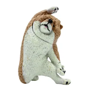 Detaillierte Nahaufnahme der lustigen tanzenden Hundefigur, einzigartige Yoga-Pose für Dekor.