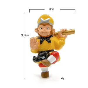 Sun Wukong miniature action figure, cute monkey king toy with golden staff, 3.5cm desktop decor.