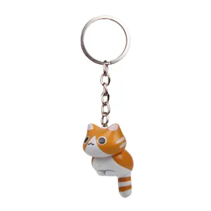 Niedlicher hockender Katzen Schlüsselanhänger orange weiße Kätzchen Tasche Charme Metall