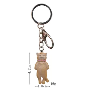 Cute sleepy cat keychain with pink collar, alloy ring and clasp, height 4.2cm, weight 16g.