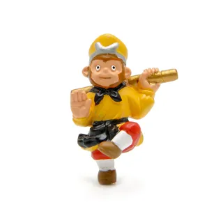 Close-up detail of the classic monkey king figurine, vibrant colors and fine craftsmanship.