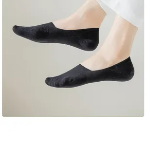 Detailed view of women's black low-cut invisible socks, breathable summer mesh design.