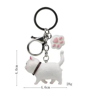 Niedlicher weißer Katzen-Schlüsselanhänger mit Pfotenanhänger, Metallverschluss für Taschen.