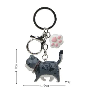 Süßer grauer Tigerkatzen-Schlüsselanhänger mit Pfote und Metallkarabiner für Taschen.