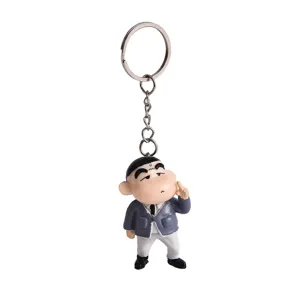 Detaillierte Nahaufnahme des niedlichen Crayon Shin-Chan Anime Cartoon Metallschlüsselanhängers.