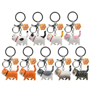 Set di portachiavi gatto cartone animato carino con ciondolo zampa per le borse.