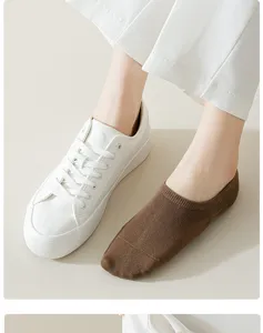 Close-up detail of women's summer thin low-cut boat socks in stylish brown cotton fabric.