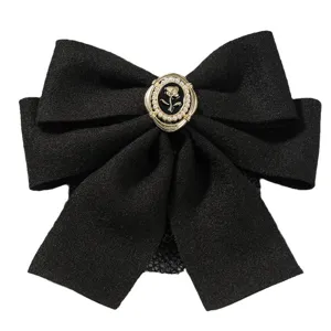Noeud papillon noir filet a cheveux pince elegante retro rose vintage pour travail femme pro.