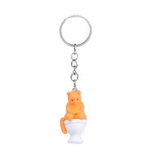 Kreativer süßer orangener Katze Toilette Schlüsselanhänger Neuheit Tasche Auto Anhänger