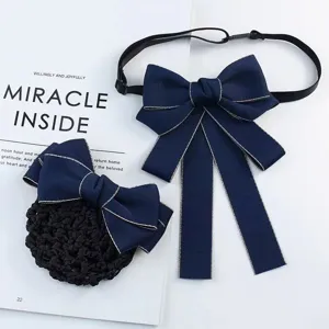 Navy blue uniform bow tie and hair net set, detailed flat lay view for professional work.
