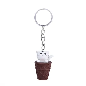 Cute cartoon cat ice cream cone keychain, creative resin bag pendant and car keyring accessory.