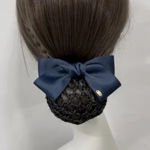 Professional navy blue hair bow and mesh net detail for neat bun styling accessories.