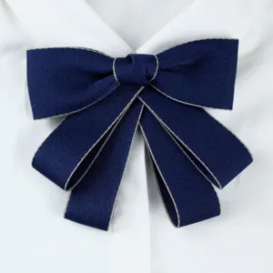 Elegant dark blue uniform bow tie with silver trim, perfect for office and school shirts.