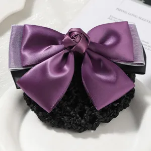 Purple satin bow hair net with a delicate rose knot, elegant accessory for professional wear.