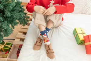 Chaussettes de Noël douillettes en polaire corail d'hiver, doux et chaleureux cadeau.