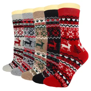 Damen dicke Wolle Wintersocken mit klassischem nordischen Weihnachts-Rentier- und Schneeflocken-Muster.