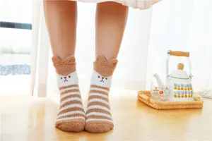 Fluffy cozy winter coral fleece socks with cute bear ears and stripes for warm home wear.