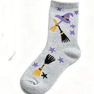 Halloween fleece sleep socks for women, cozy winter thermal fuzzy socks with cute witch hat print.