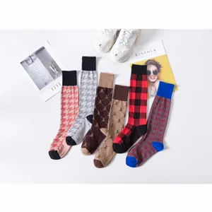 Stylish women knee high cotton socks with trendy patterns for daily wear and Japanese JK style.