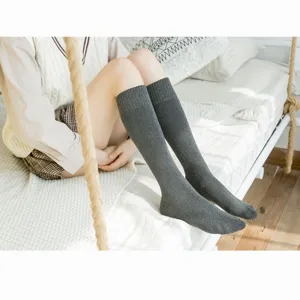 Cozy winter thick thermal grey knee high socks for women, comfortable soft cotton long socks.