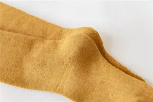 Winter thickened fleece-lined women long socks warm knit mustard yellow stockings detail