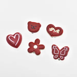 Niedlich Cartoon Weinrot Bär Herz Blume Schmetterling Legierung Manschettenknöpfe Süß Stil Dekorative Knöpfe Bekleidungszubehör