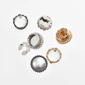Detailed view of elegant pearl and rhinestone cufflink components for women shirts and fashion buttons.