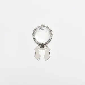 Silver-tone metal cufflink detail featuring clear faceted crystal and secure clip design.
